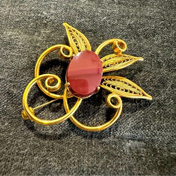 Vintage Jewelry - Vintage Filigree Gold Colored Floral Brooch With Plum Stone Center